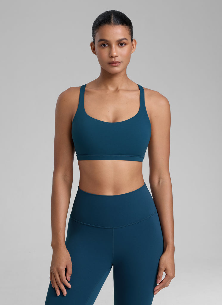 CRZ YOGA Women's Yoga Light Support Nakedfeel Strappy Bra Low Cut French Navy