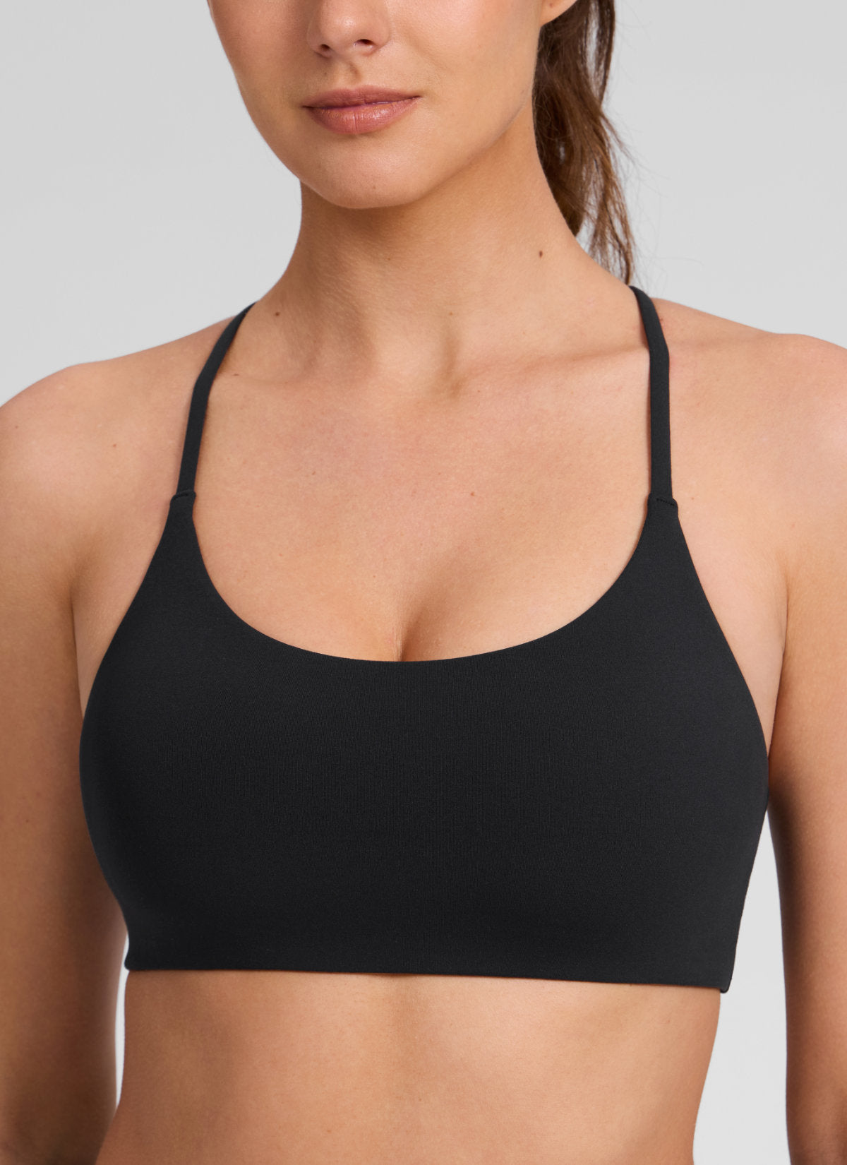 CRZ YOGA Women's Butterlift® Yoga V Back Double Lined Sports Bra Black @model_info:Gelya