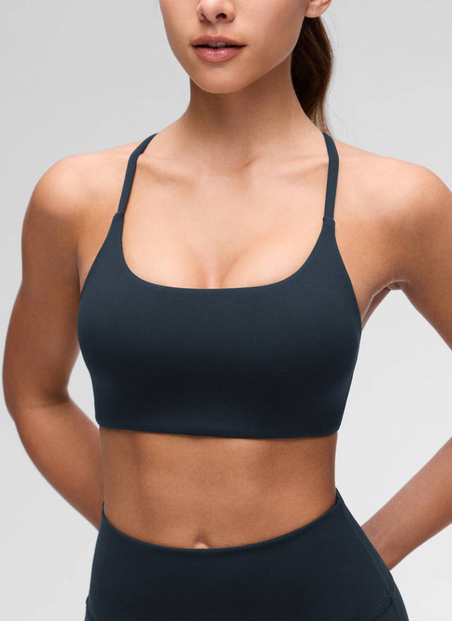 CRZ YOGA Women's Butterluxe Yoga Scoop Neck Twist Cross Back Sport Bra True Navy @model_info:Maria