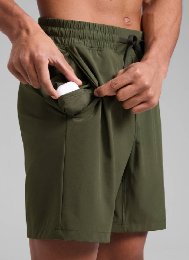 CRZ YOGA Men's Train Classic Fit Feathery-Fit Linerless Shorts 7'' Dark Olive @model_info:Rafael