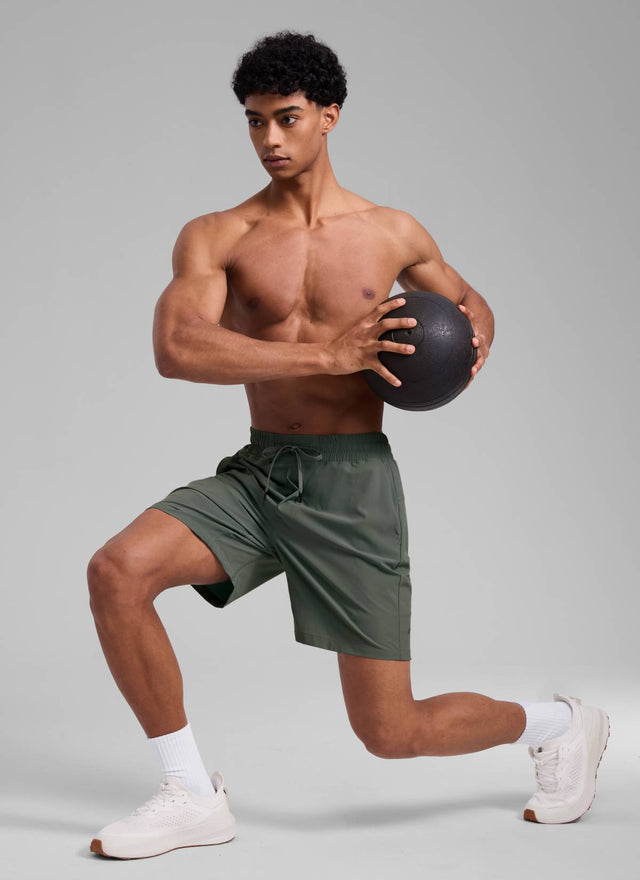 CRZ YOGA Men's Train Run Classic Fit Feathery-Fit Lined Shorts 7'' Grey Sage @model_info:Rafael