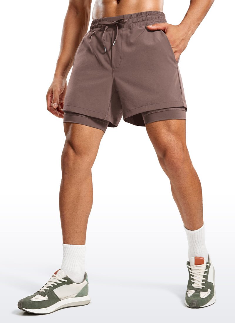 CRZ YOGA Men's Train Relaxed Fit Feathery-Fit 2 in 1 Shorts 5'' with Long Liner Brown Rock @model_info:Jhony