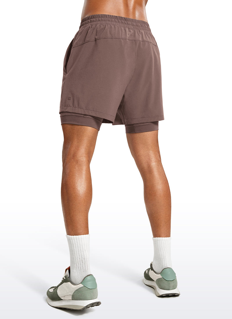CRZ YOGA Men's Train Relaxed Fit Feathery-Fit 2 in 1 Shorts 5'' with Long Liner Brown Rock @model_info:Jhony
