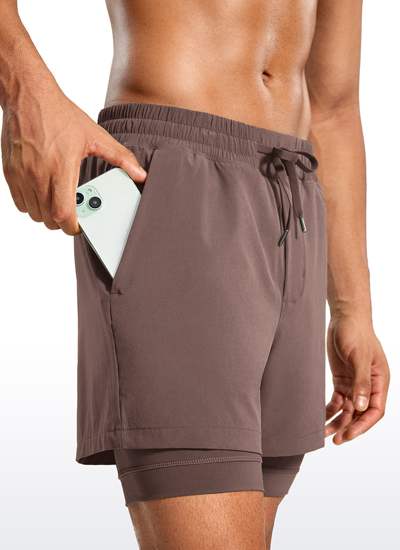 CRZ YOGA Men's Train Relaxed Fit Feathery-Fit 2 in 1 Shorts 5'' with Long Liner Brown Rock @model_info:Jhony
