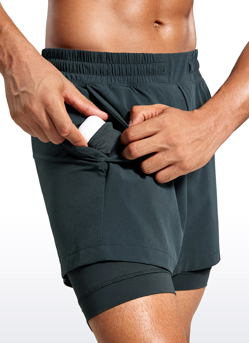 CRZ YOGA Men's Train Relaxed Fit Feathery-Fit 2 in 1 Shorts 5'' with Long Liner Melanite @model_info:Jhony