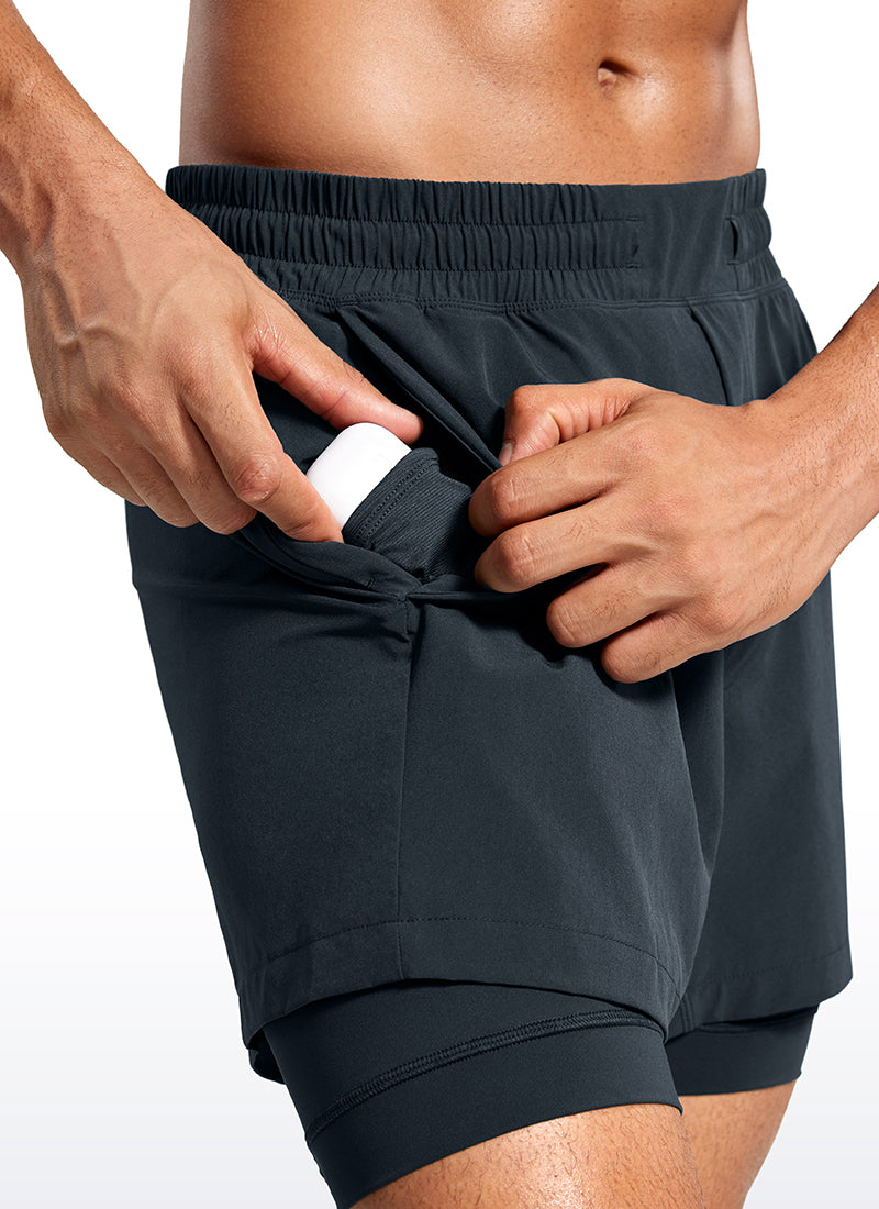 CRZ YOGA Men's Train Relaxed Fit Feathery-Fit 2 in 1 Shorts 5'' with Long Liner True Navy @model_info:Jhony