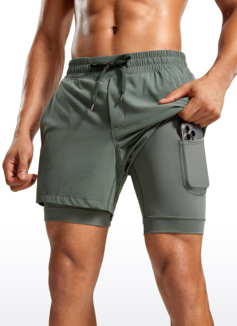 CRZ YOGA Men's Train Relaxed Fit Feathery-Fit 2 in 1 Shorts 5'' with Long Liner Grey Sage @model_info:Jhony