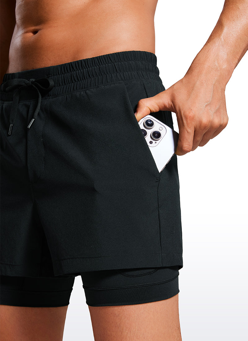 CRZ YOGA Men's Train Feathery-Fit 2 in 1 Shorts 3.5'' with pockets Black @model_info:Maxim
