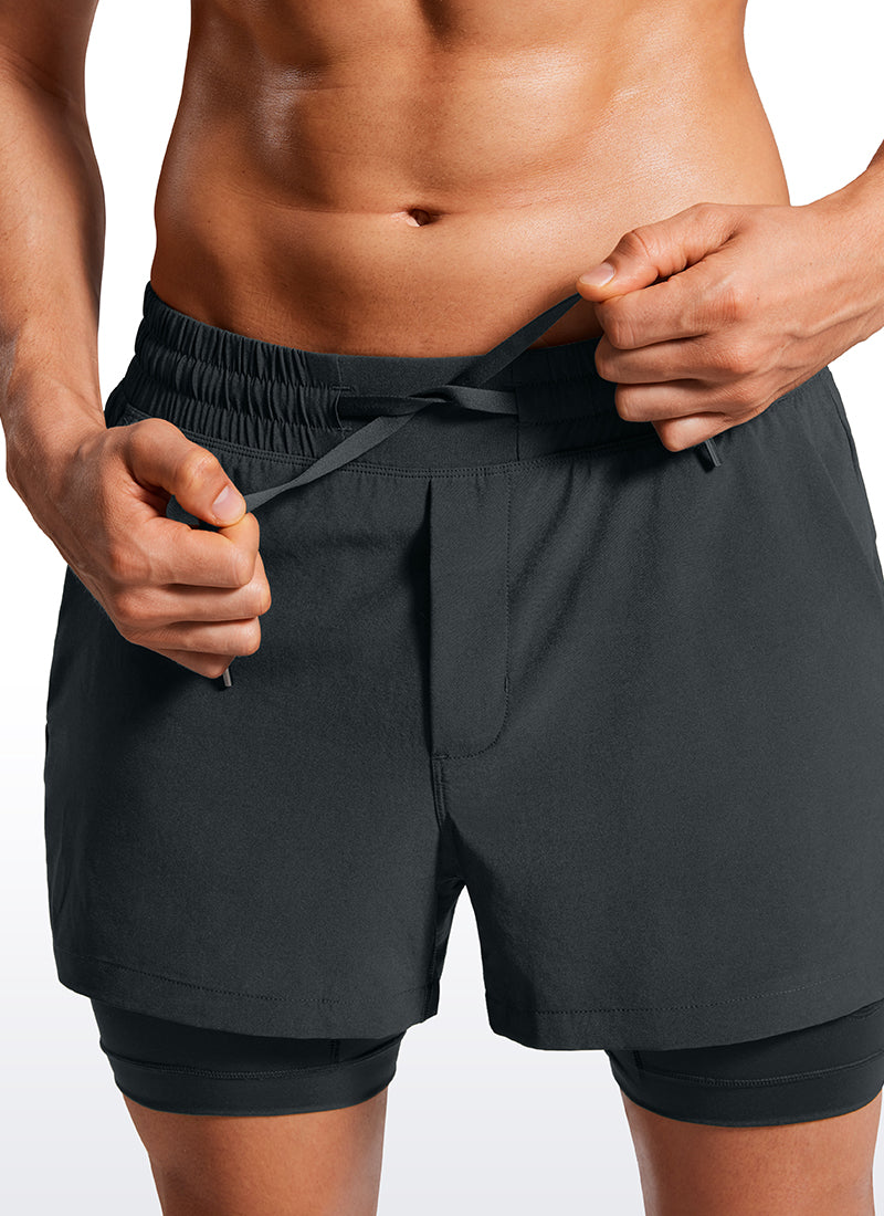 CRZ YOGA Men's Train Feathery-Fit 2 in 1 Shorts 3.5'' with pockets Ink Gray @model_info:Maxim