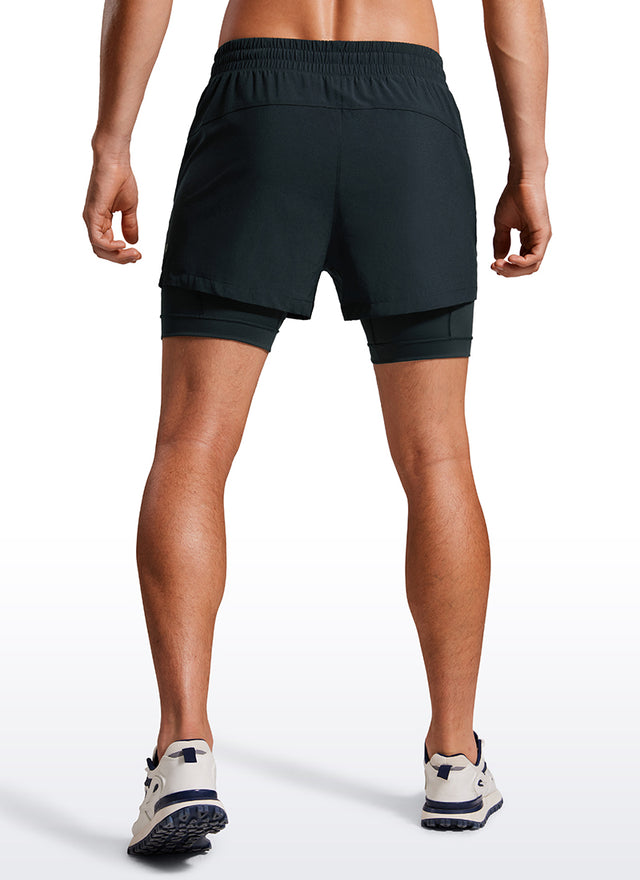 CRZ YOGA Men's Train Feathery-Fit 2 in 1 Shorts 3.5'' with pockets True Navy