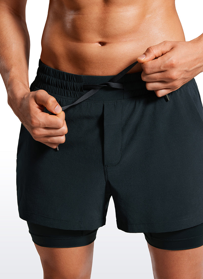 CRZ YOGA Men's Train Feathery-Fit 2 in 1 Shorts 3.5'' with pockets True Navy