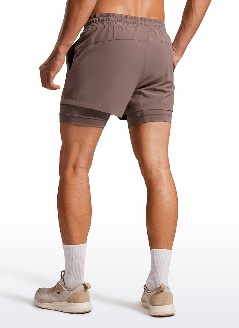 CRZ YOGA Men's Train Feathery-Fit 2 in 1 Shorts 3.5'' with pockets Brown Rock @model_info:Maxim