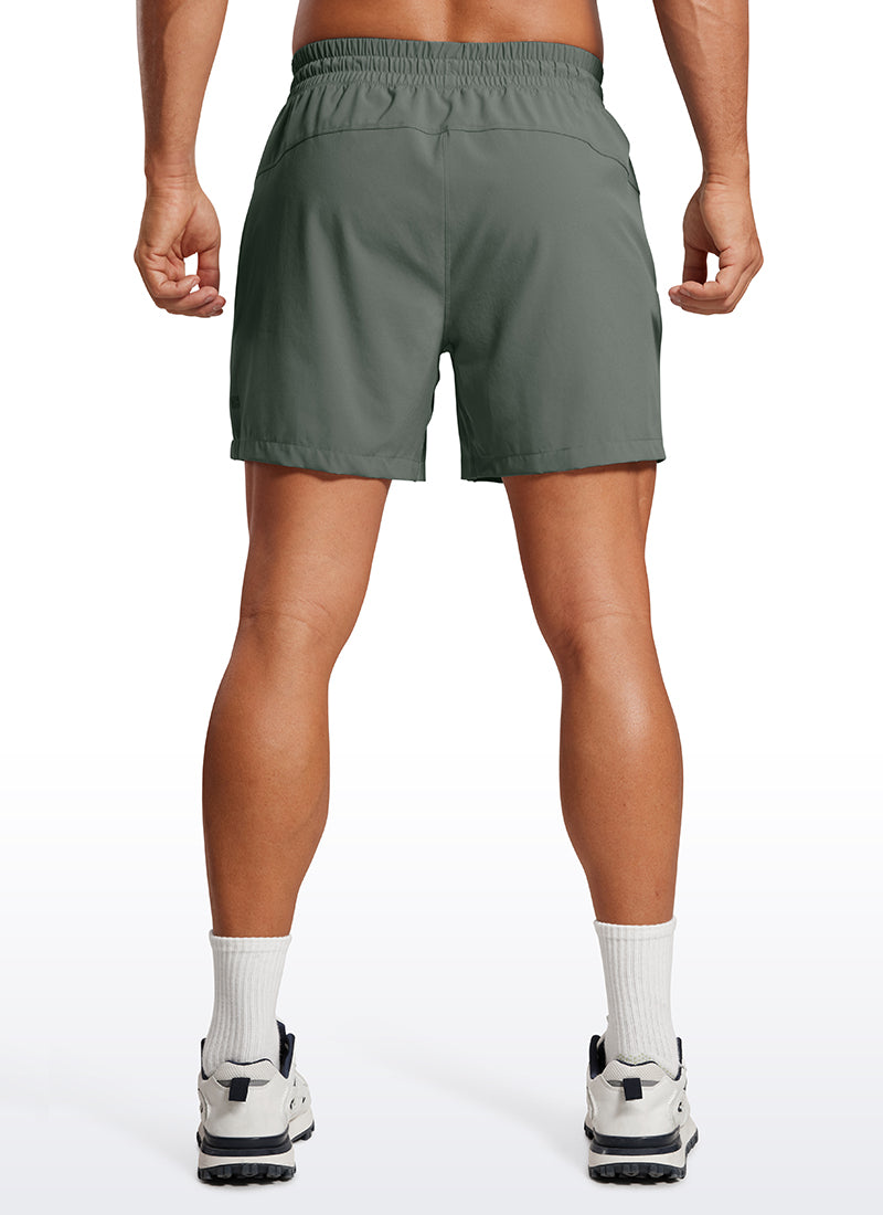 CRZ YOGA Men's Train Feathery-Fit 2 in 1 Shorts 5'' with pockets Grey Sage @model_info:Mazi