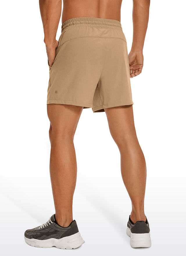 CRZ YOGA Men's Running Feathery-Fit Workout Linerless Shorts 5'' Khaki Sand @model_info:M