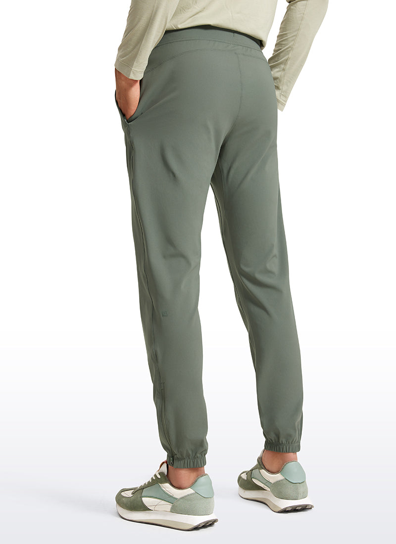 CRZ YOGA Men's Run Slim Fit On the Travel Joggers 30''- Ankle Zipper Grey Sage @model_info:Jhony