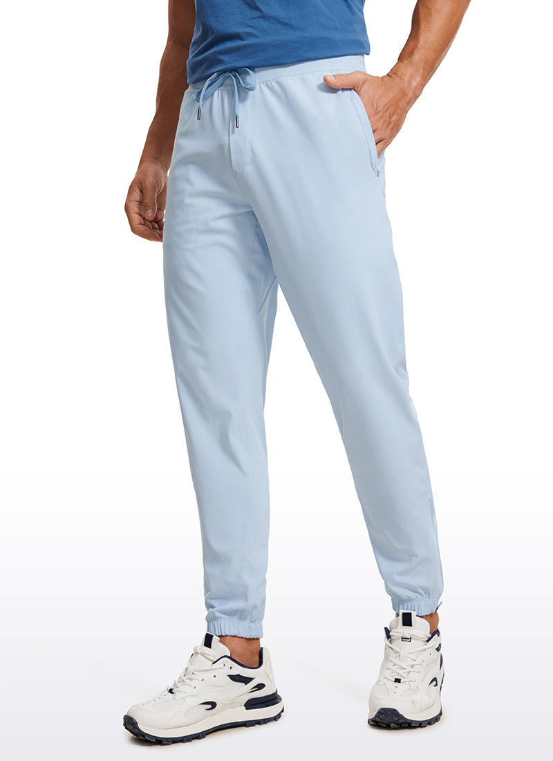 CRZ YOGA Men's Run Slim Fit On the Travel Joggers 30''- Ankle Zipper Chambray Blue @model_info:ALE
