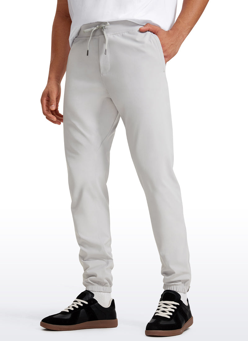 CRZ YOGA Men's Run Slim Fit On the Travel Joggers 30''- Ankle Zipper Platinum Grey @model_info:Jhony