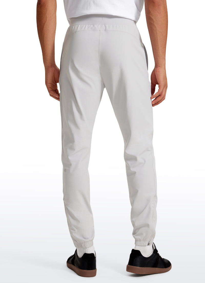 CRZ YOGA Men's Run Slim Fit On the Travel Joggers 30''- Ankle Zipper Platinum Grey