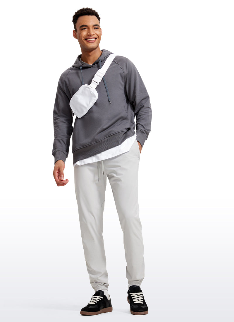 CRZ YOGA Men's Run Slim Fit On the Travel Joggers 30''- Ankle Zipper Platinum Grey @model_info:Jhony
