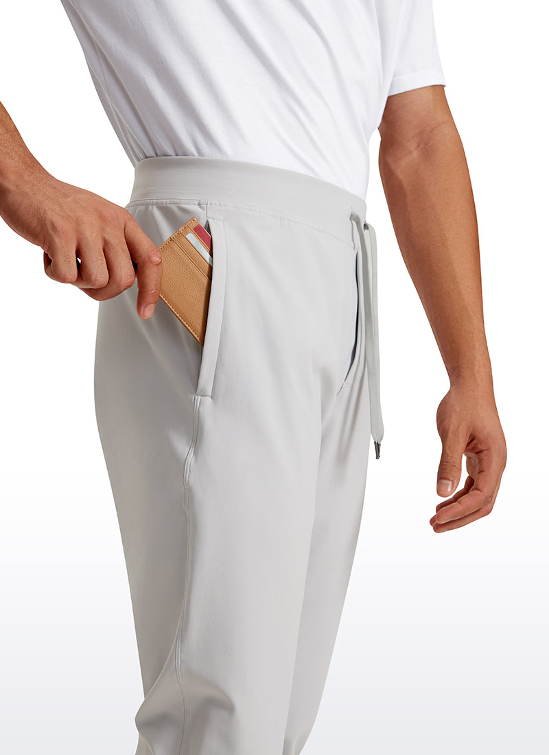 CRZ YOGA Men's Run Slim Fit On the Travel Joggers 30''- Ankle Zipper Platinum Grey @model_info:Jhony