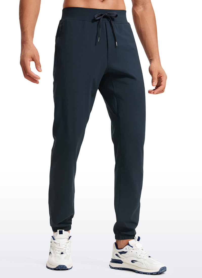 CRZ YOGA Men's Run Slim Fit On the Travel Joggers 30''- Ankle Zipper True Navy