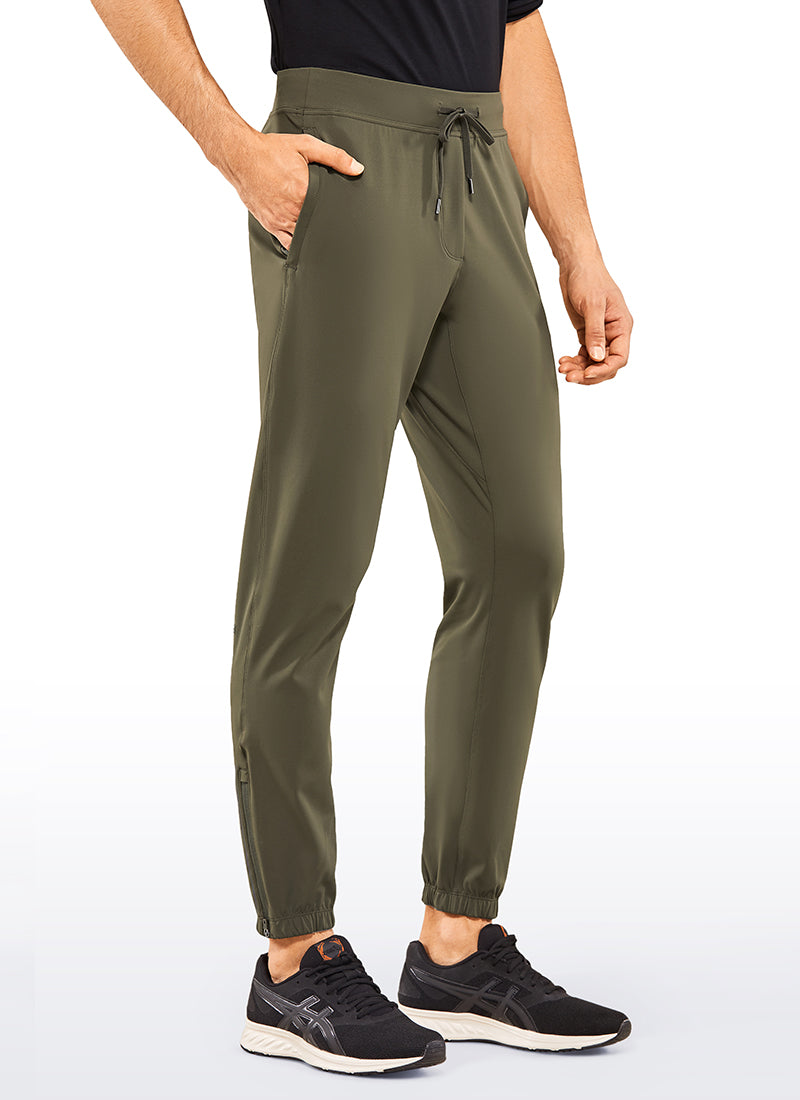 CRZ YOGA Men's Run Slim Fit On the Travel Joggers 30''- Ankle Zipper Dark Olive @model_info:L