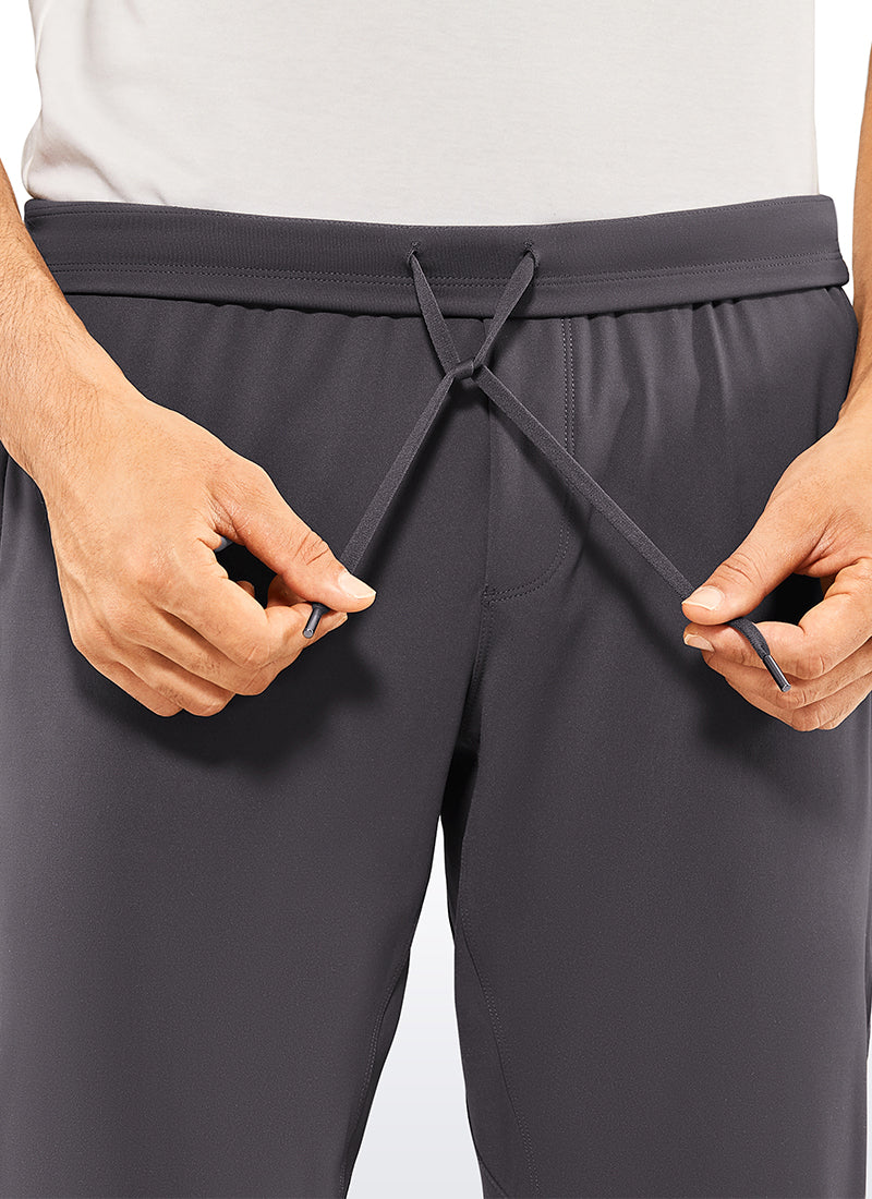 CRZ YOGA Men's Run Slim Fit On the Travel Joggers 30''- Ankle Zipper Ink Gray @model_info:L