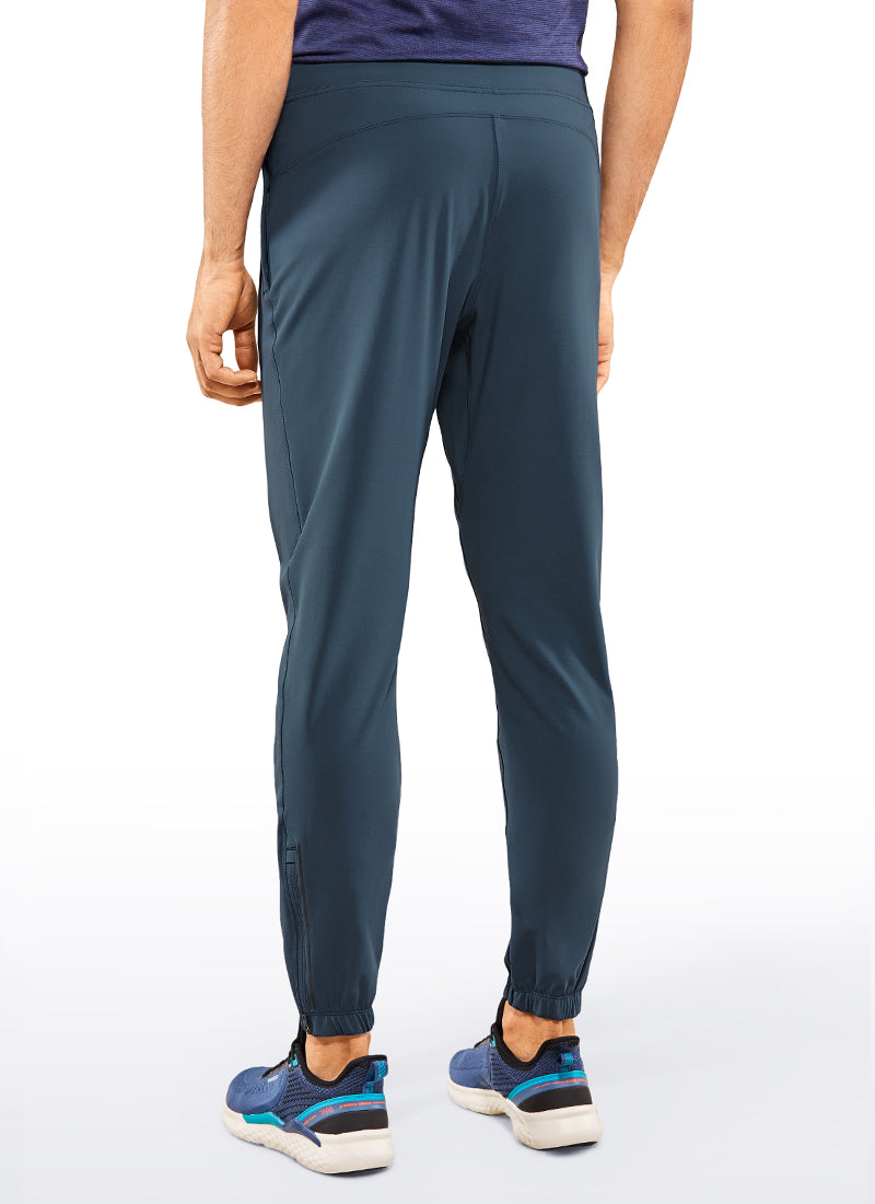 CRZ YOGA Men's Run Slim Fit On the Travel Joggers 30''- Ankle Zipper Electric Blue