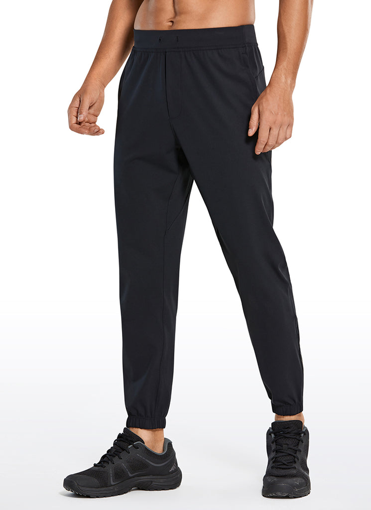 CRZ YOGA Men's Run Slim Fit On the Travel Joggers 28''- Ankle Zipper Black