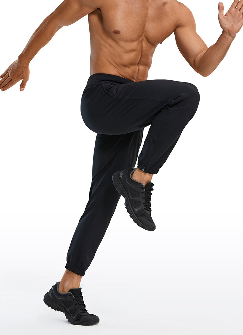 CRZ YOGA Men's Run Slim Fit On the Travel Joggers 28''- Ankle Zipper Black @model_info:M