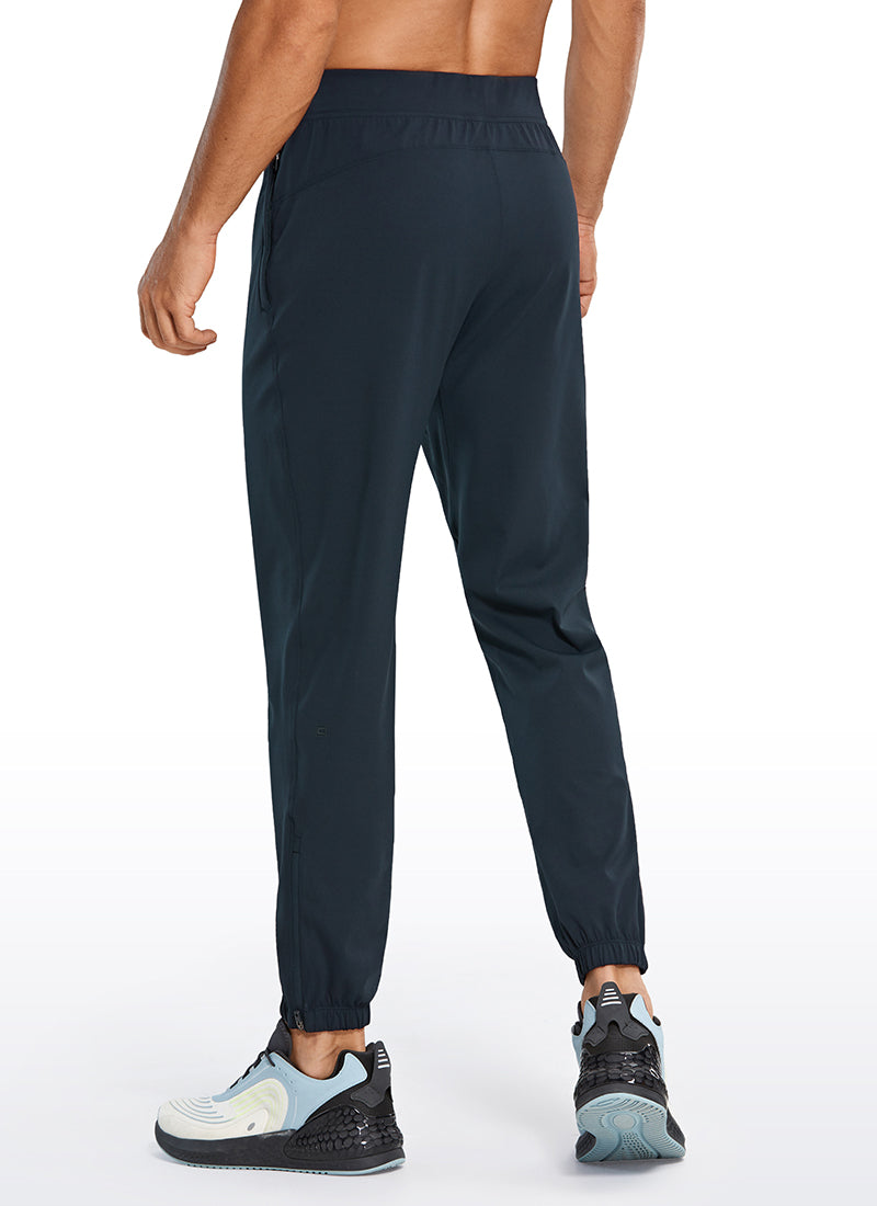 CRZ YOGA Men's Run Slim Fit On the Travel Joggers 28''- Ankle Zipper True Navy @model_info:M