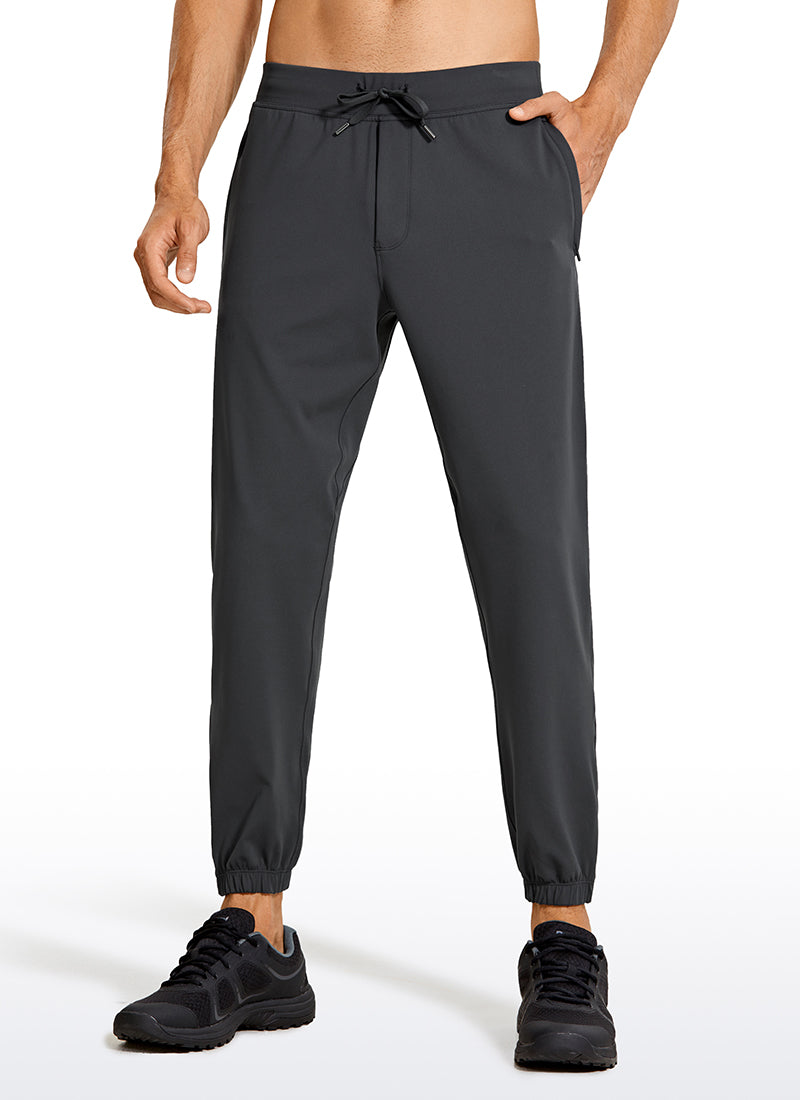 CRZ YOGA Men's Run Slim Fit On the Travel Joggers 28''- Ankle Zipper Ink Gray