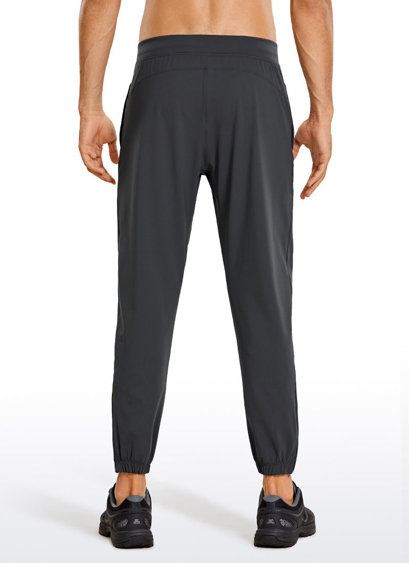 CRZ YOGA Men's Run Slim Fit On the Travel Joggers 28''- Ankle Zipper Ink Gray