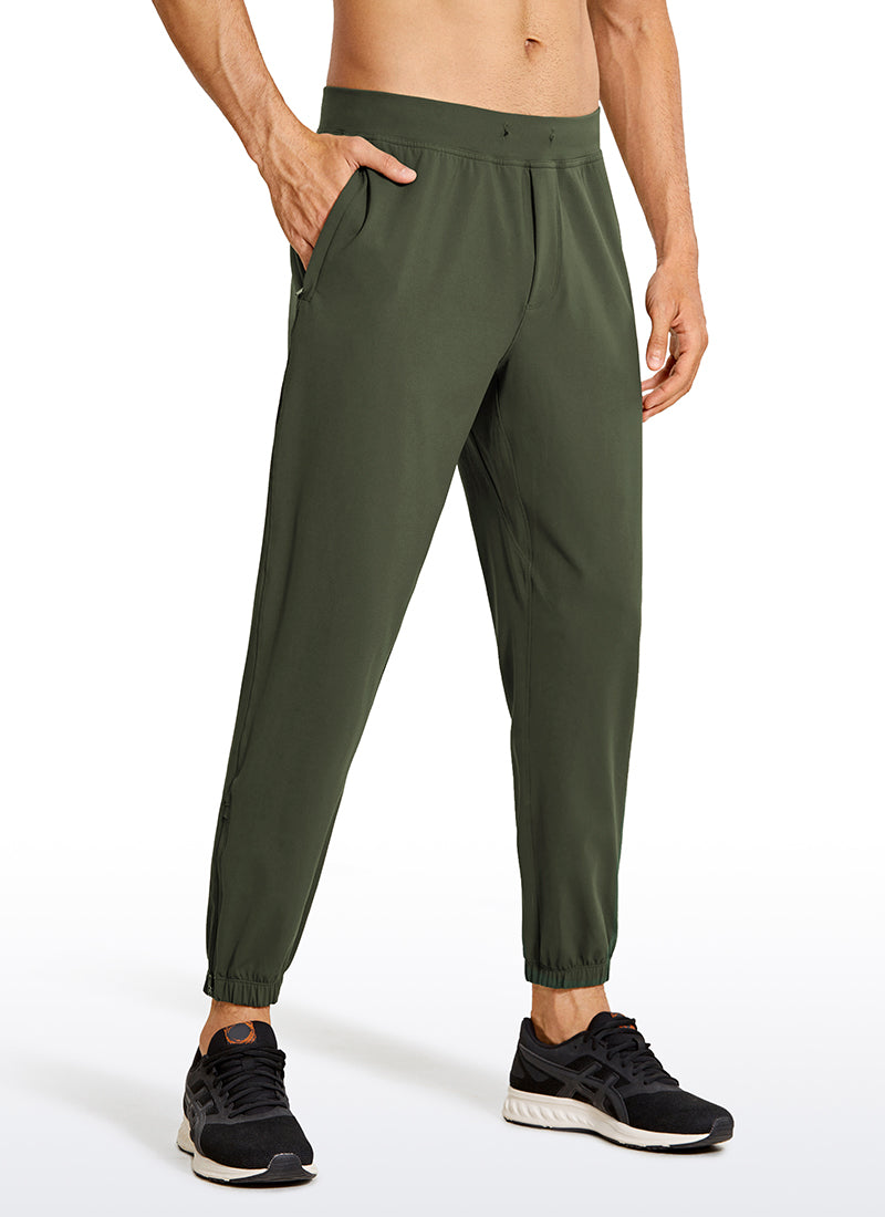 CRZ YOGA Men's Run Slim Fit On the Travel Joggers 28''- Ankle Zipper Dark Olive
