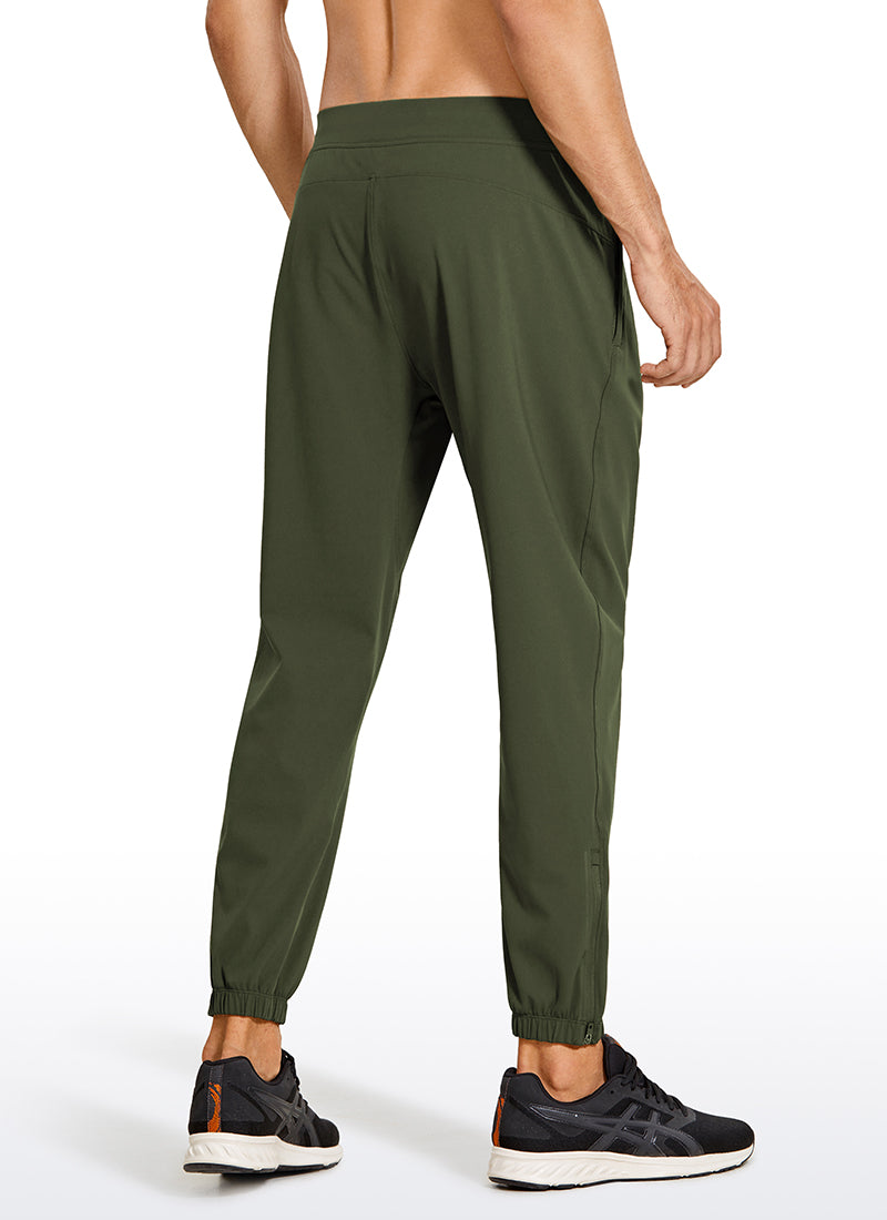 CRZ YOGA Men's Run Slim Fit On the Travel Joggers 28''- Ankle Zipper Dark Olive