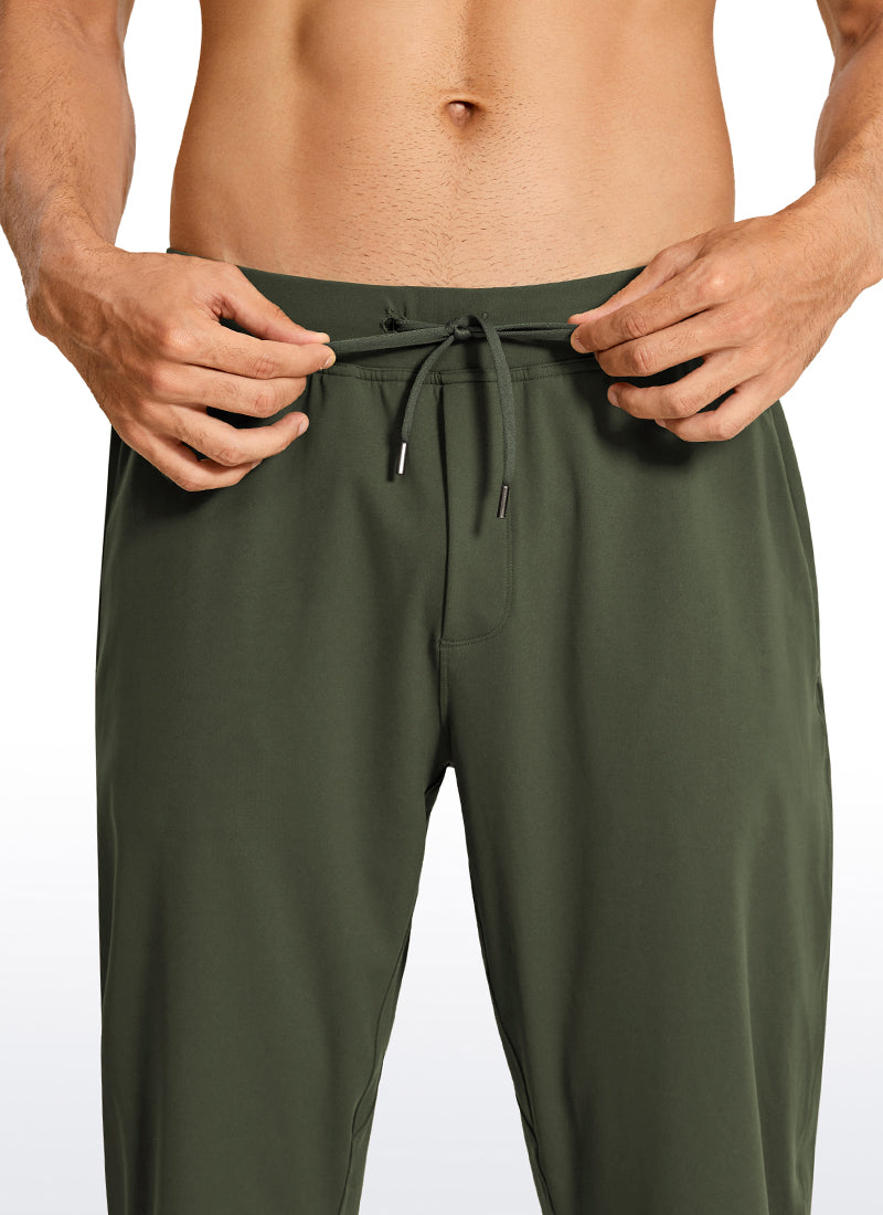 CRZ YOGA Men's Run Slim Fit On the Travel Joggers 28''- Ankle Zipper Dark Olive @model_info:M