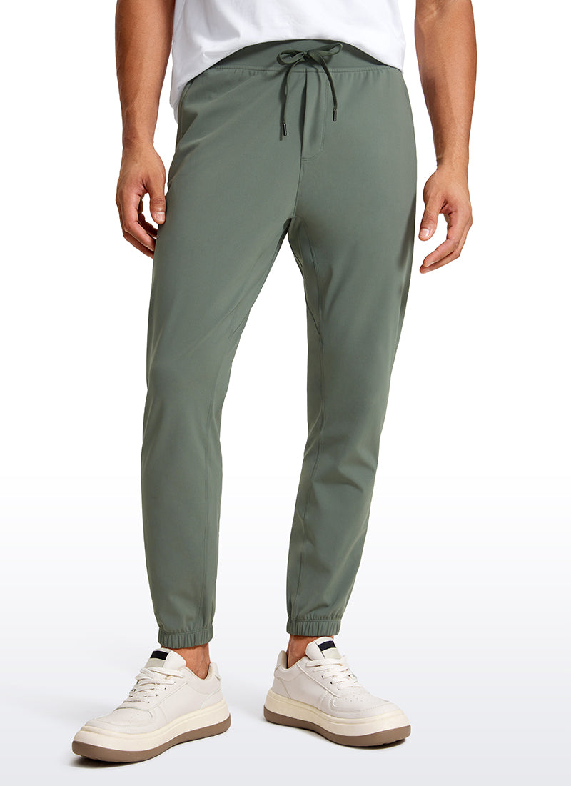 CRZ YOGA Men's Run Slim Fit On the Travel Joggers 28''- Ankle Zipper Grey Sage @model_info:Jhony