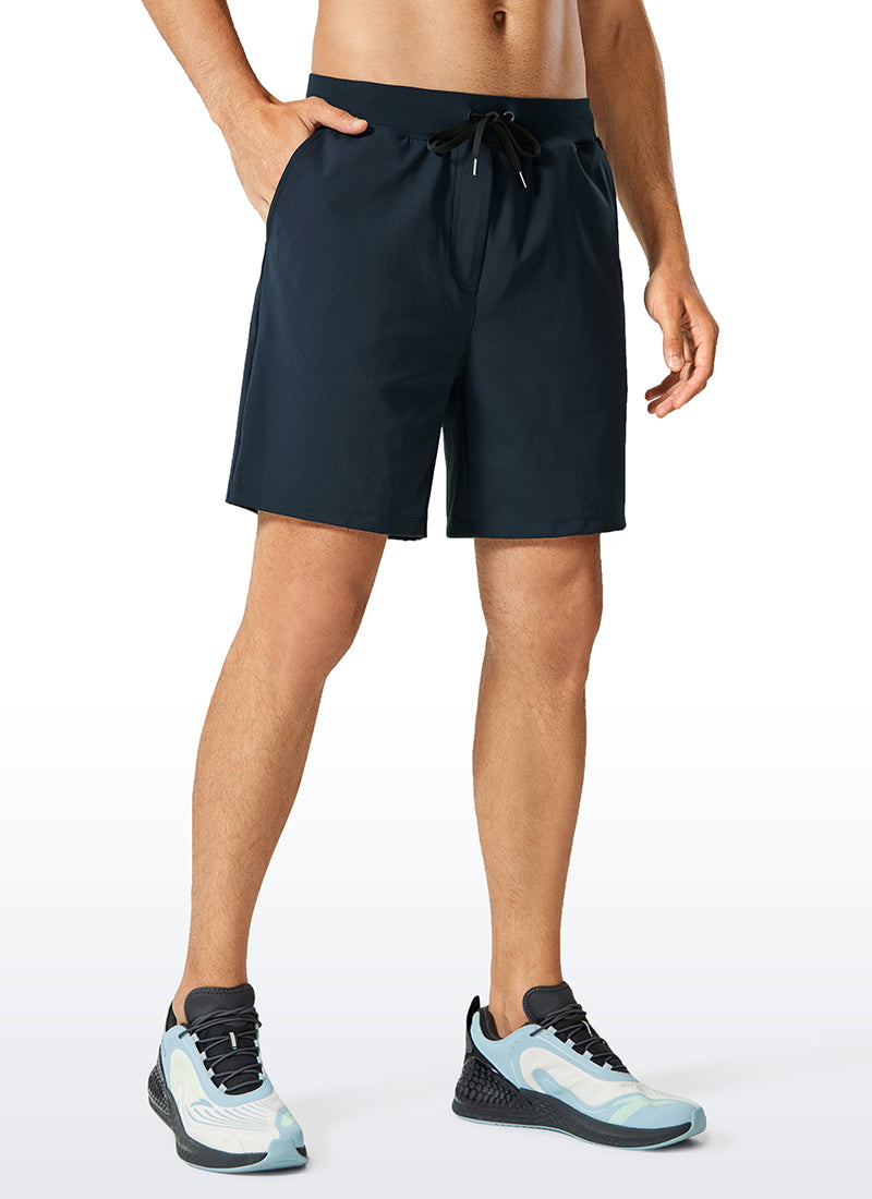 CRZ YOGA Men's Train Relaxed Fit On the Travel Linerless Shorts 7'' True Navy @model_info:M