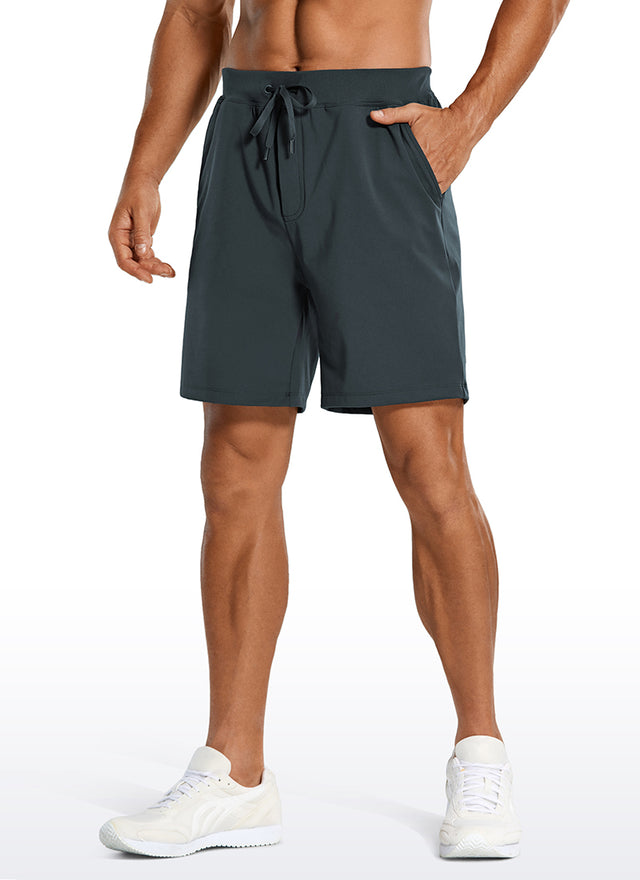CRZ YOGA Men's Train Relaxed Fit On the Travel Linerless Shorts 7'' Melanite @model_info:A