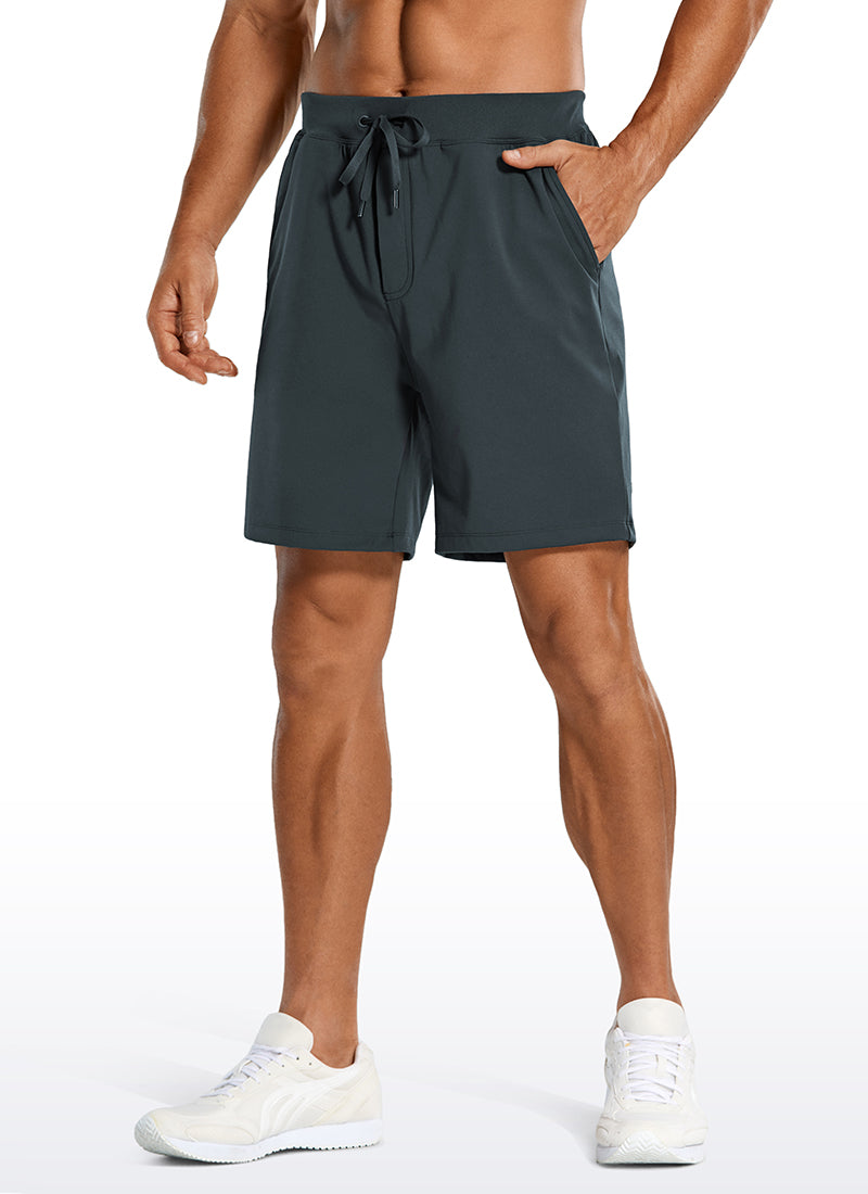 CRZ YOGA Men's Train Relaxed Fit On the Travel Linerless Shorts 7'' Melanite @model_info:A