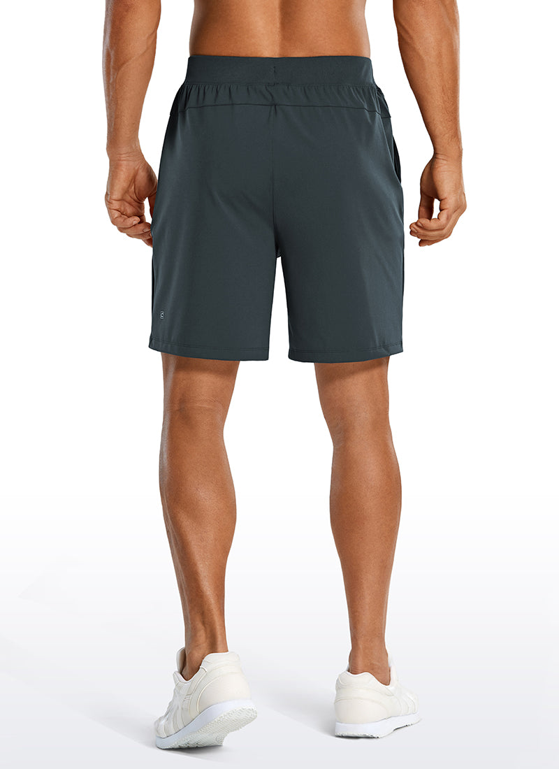 CRZ YOGA Men's Train Relaxed Fit On the Travel Linerless Shorts 7'' Melanite @model_info:A