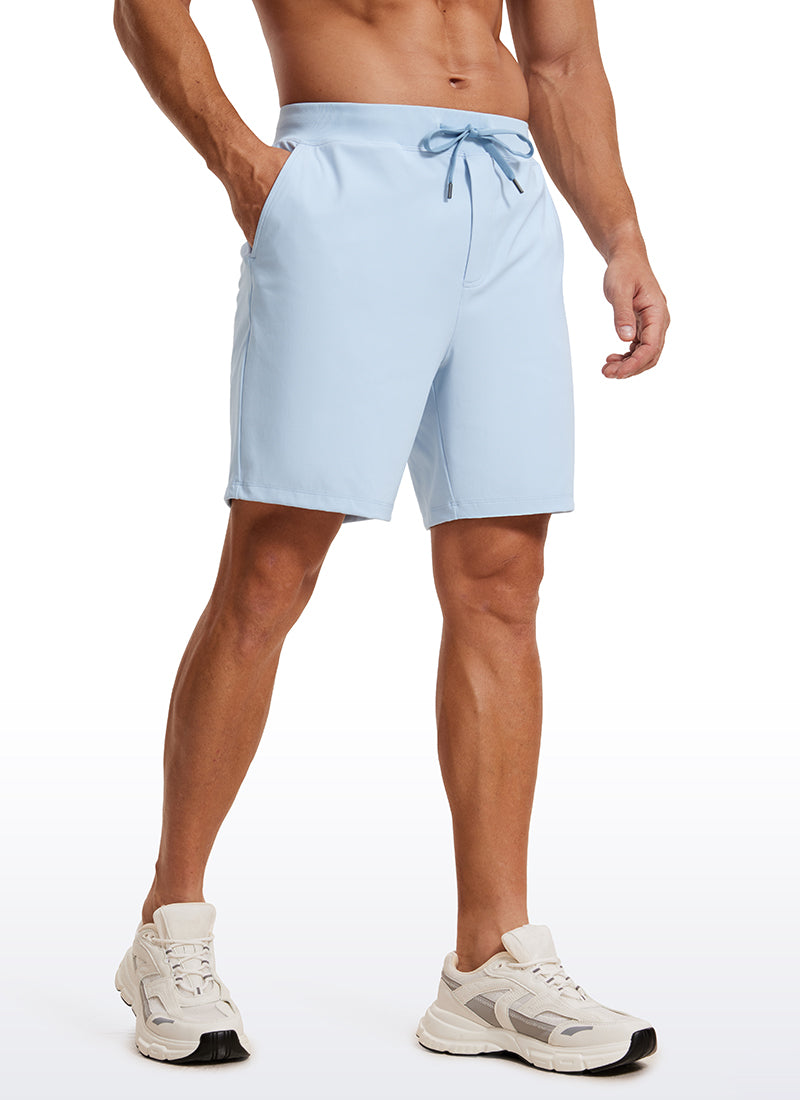 CRZ YOGA Men's Train Relaxed Fit On the Travel Linerless Shorts 7'' Chambray Blue @model_info:ALE