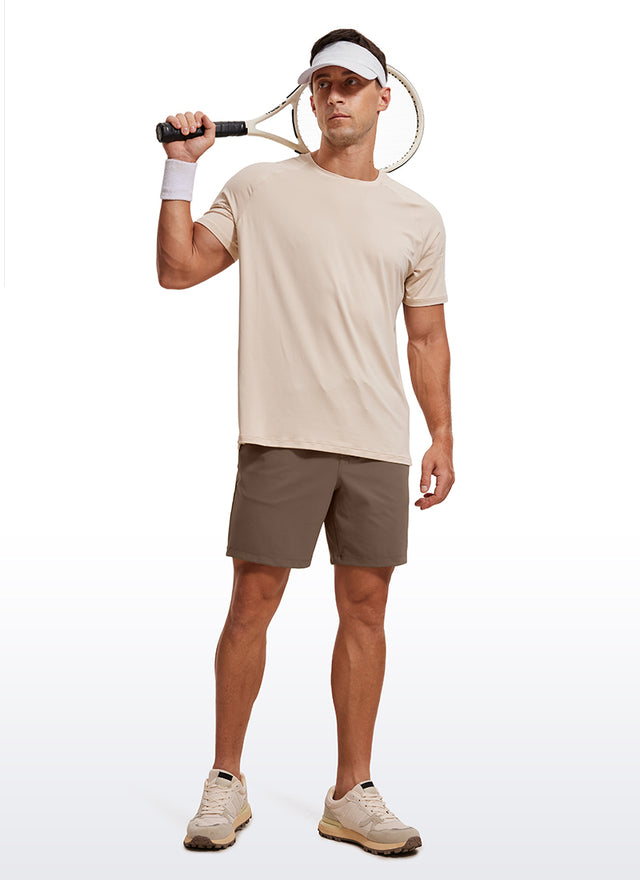 CRZ YOGA Men's Train Relaxed Fit On the Travel Linerless Shorts 7'' Dark Olive Brown @model_info:ALE