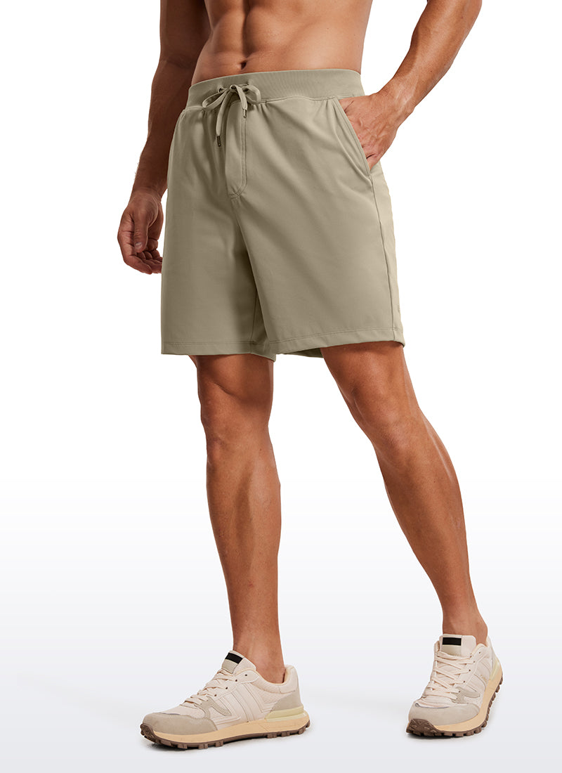 CRZ YOGA Men's Train Relaxed Fit On the Travel Linerless Shorts 7'' Khali Barley @model_info:ALE