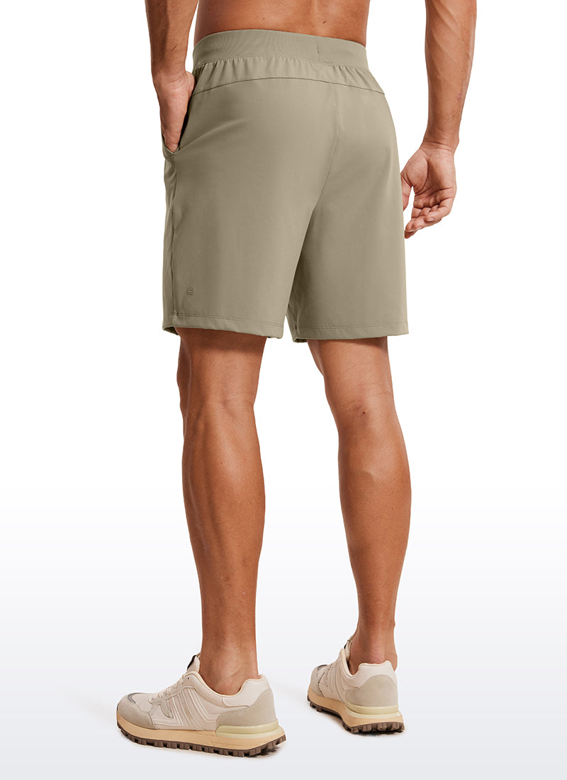 CRZ YOGA Men's Train Relaxed Fit On the Travel Linerless Shorts 7'' Khali Barley @model_info:ALE