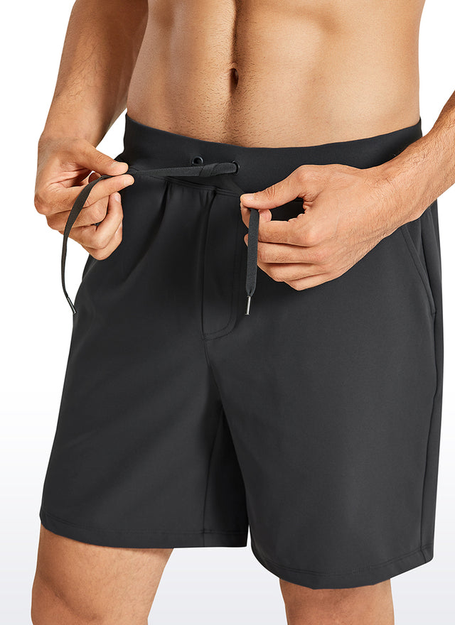 CRZ YOGA Men's Train Relaxed Fit On the Travel Linerless Shorts 7'' Ink Gray @model_info:M