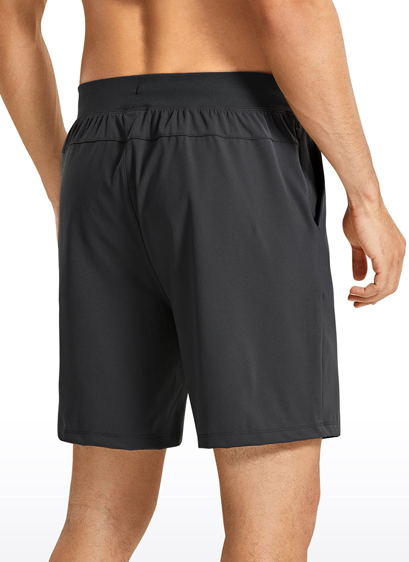 CRZ YOGA Men's Train Relaxed Fit On the Travel Linerless Shorts 7'' Ink Gray @model_info:M