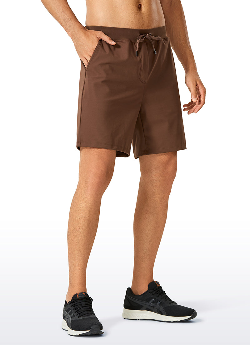 CRZ YOGA Men's Train Relaxed Fit On the Travel Linerless Shorts 7'' Dark Brown