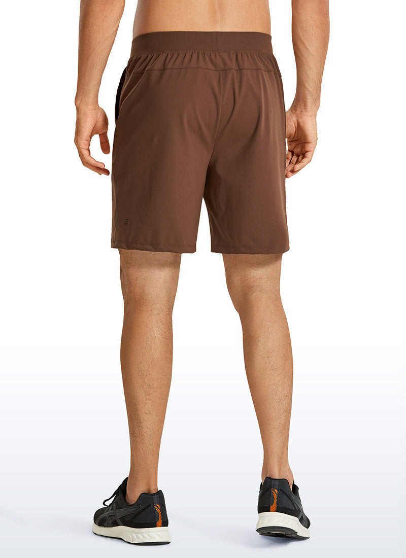 CRZ YOGA Men's Train Relaxed Fit On the Travel Linerless Shorts 7'' Dark Brown @model_info:M