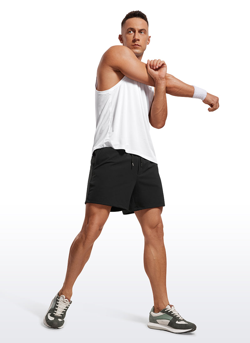 CRZ YOGA Men's Train Relaxed Fit On the Travel Linerless Shorts 5'' Black @model_info:Mazi